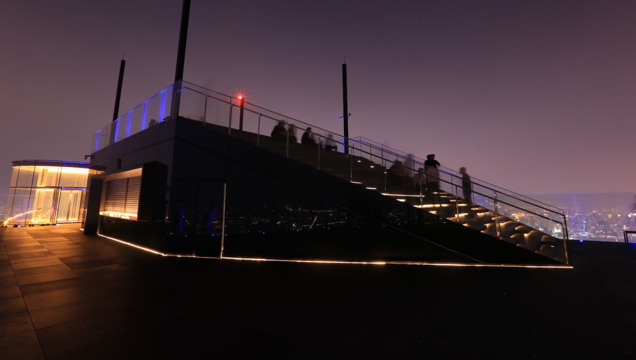 <strong>The Peak:</strong> From the SkyWalk, visitors can go up a set of stairs for views from "The Peak." The bar, which serves cocktails, beer and soft drinks, is on the left.  