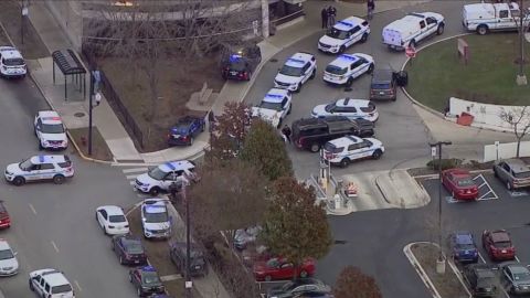 Police say Monday's shooting began in a parking lot at Mercy Hospital in Chicago.