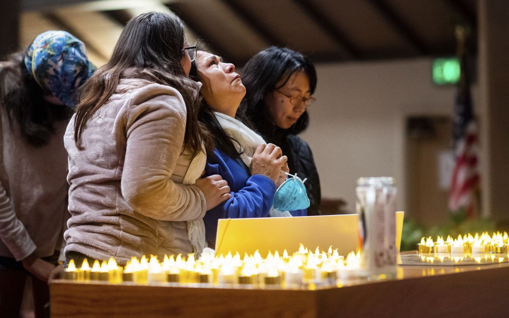 Lidia Steineman, who lost her home in the Camp Fire, prays during a vigil for fire victims on November 18 in Chico, California. More than 50 people gathered at the memorial service.