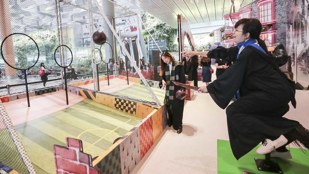 Fans balance on a broomstick while attempting this activity based on the wizarding sport Quidditch.