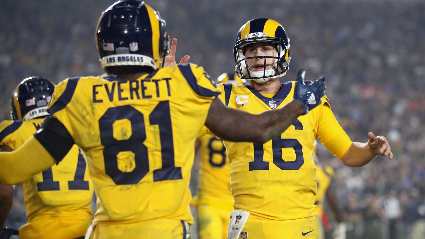 Quarterback Jared Goff #16 of the Los Angeles Rams celebrates with teammate Gerald Everett. 