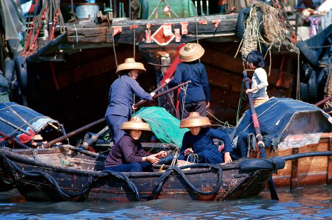 Flat-bottomed boats, known as sampans, were a common sight in Hong Kong in the 1980s.
