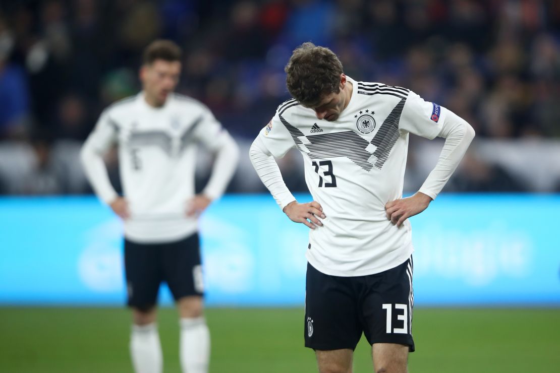 Thomas Muller of Germany looks dejected following his side's draw.