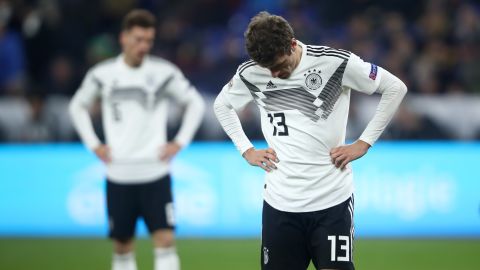 Thomas Muller of Germany looks dejected following his side's draw.