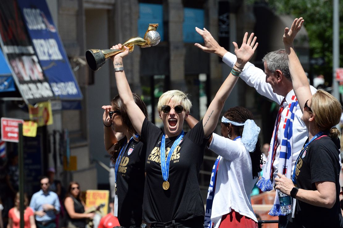 Rapinoe and her teammates celebrate Women's World Cup success in 2015 with a ticker tape parade in New York.