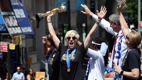 Rapinoe and her teammates celebrate Women's World Cup success in 2015 with a ticker tape parade in New York.