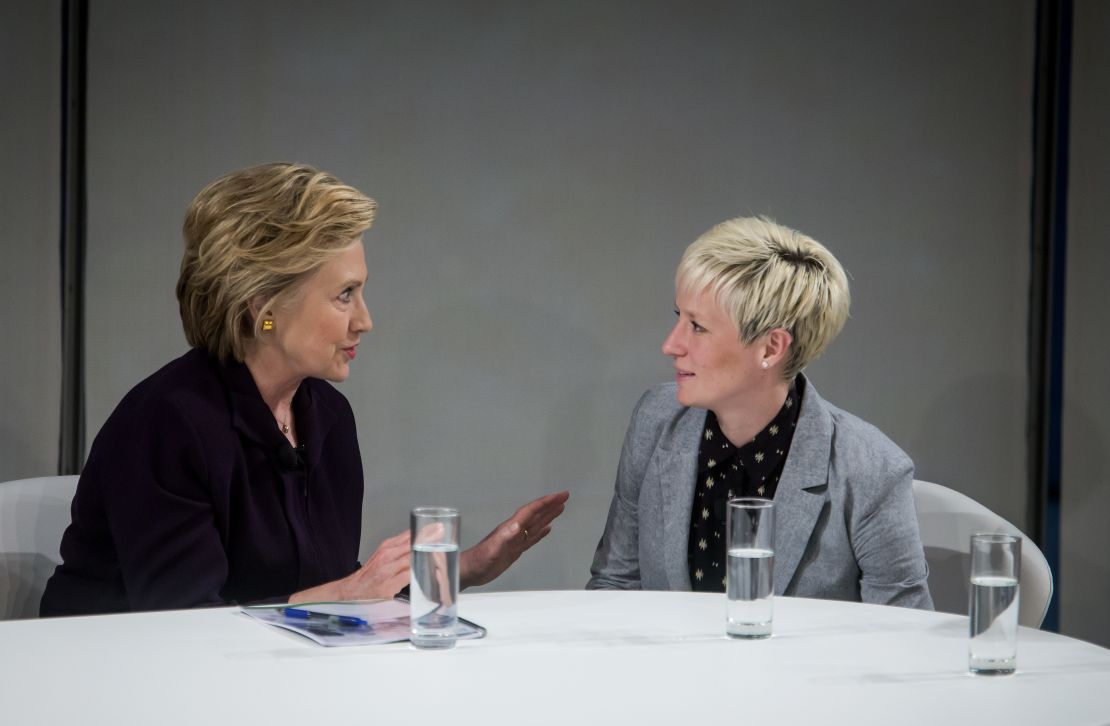 Rapinoe talks to then Democratic presidential candidate Hillary Clinton during a roundtable discussion on pay equality. 