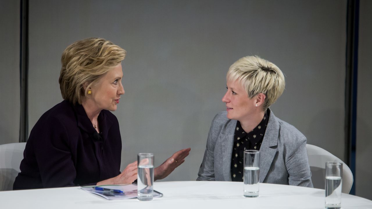 Rapinoe talks to then Democratic presidential candidate Hillary Clinton during a roundtable discussion on pay equality.