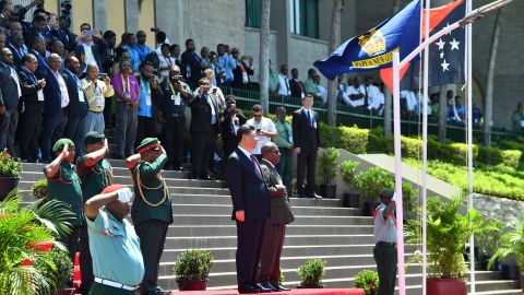 China's President Xi Jinping stands with Papau New Guinea's Governor General Bob Dadae during a welcoming ceremony at Parliament House in Port Moresby on November 16, 2018.