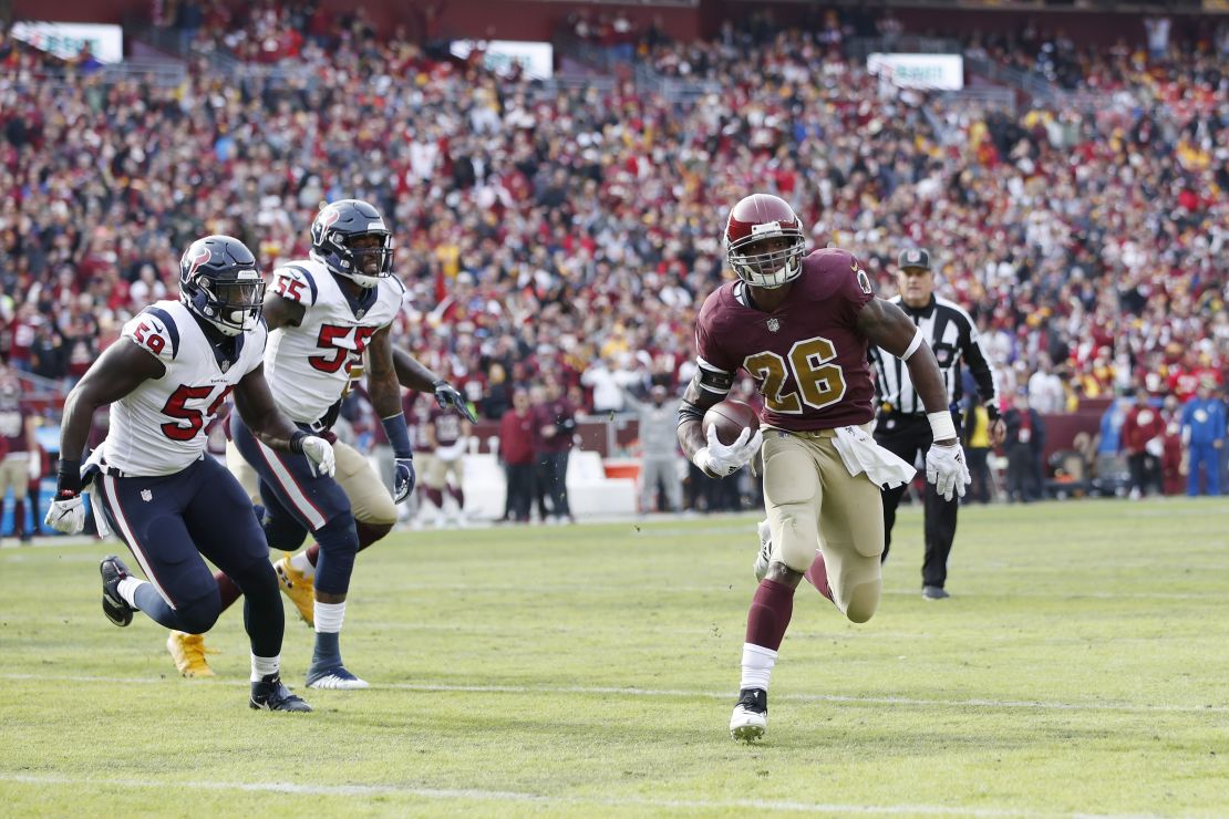 Adrian Peterson runs for a three-yard touchdown against Houston.