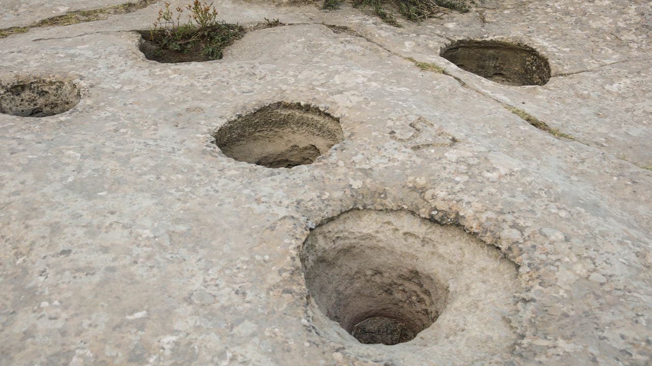 <strong>Cupules:</strong> It's believed that these holes were dug for collecting rain-water and also blood from sacrificed animals. 