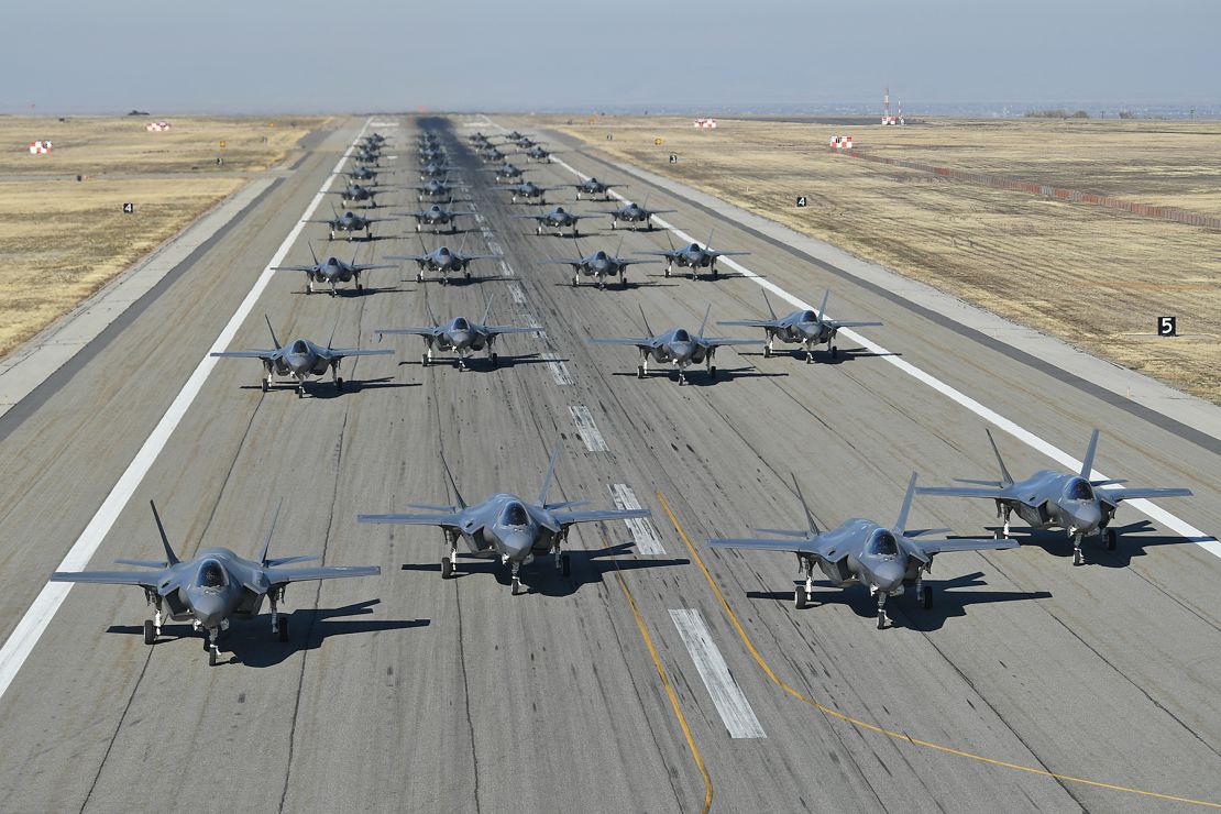 Dozens of US Air Force F-35 fighters taxi on the runway in preparation for a combat power exercise on Nov. 19, 2018, at Hill Air Force Base, Utah. 