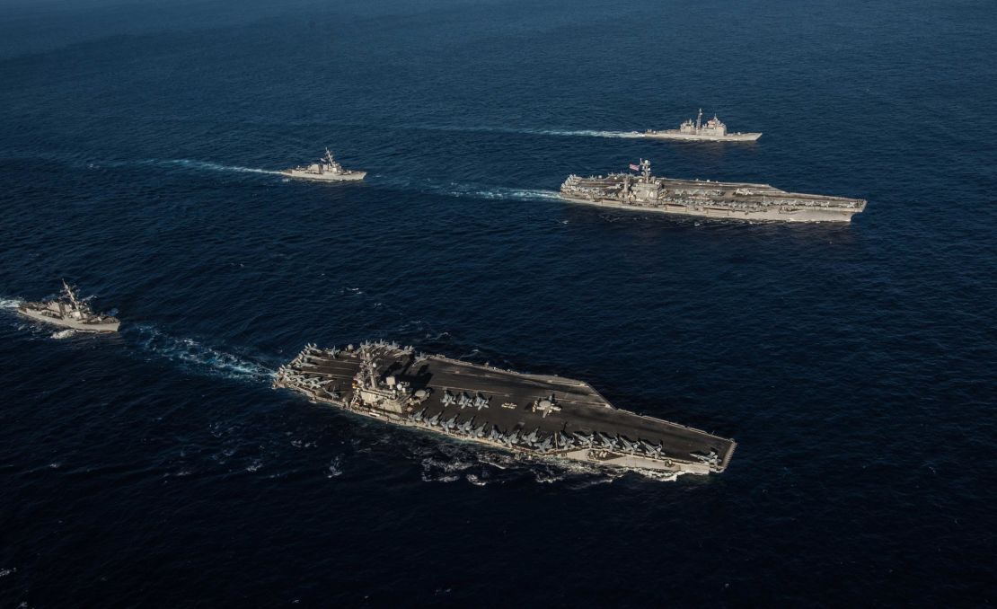 Ships attached to the Ronald Reagan Carrier Strike Group and John C. Stennis Carrier Strike Group transit the Philippine Sea during dual carrier operations.