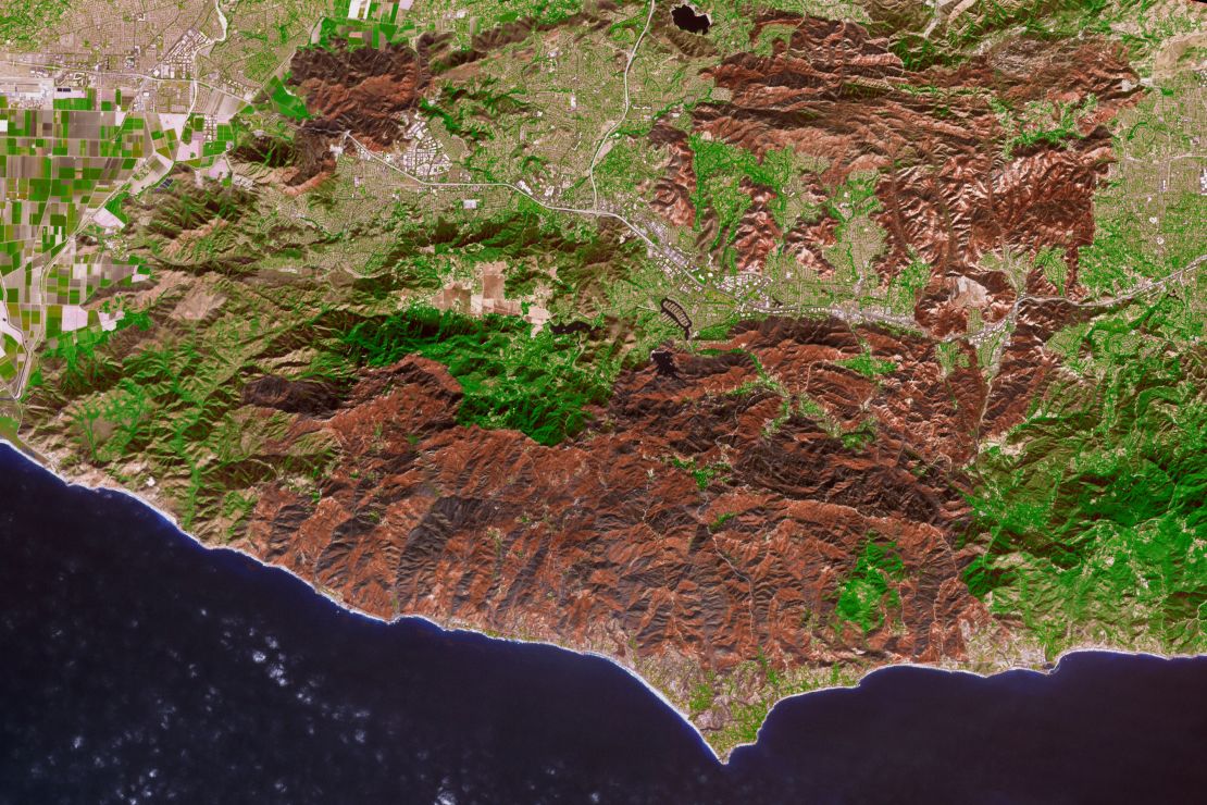The burned areas from the Woolsey Fire are brown; unburned vegetation is green. The light gray or white areas are buildings, roads and other developed areas.