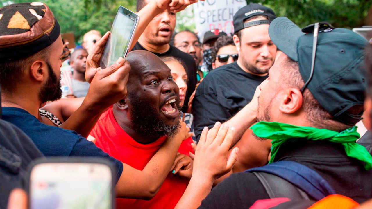 Antifa and counter protesters to a far-right rally argue in Washington in August 2018.