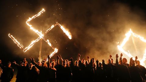 One of the largest neo-Nazi groups in the US had a swastika burning after a rally this April in Draketown, Georgia.
