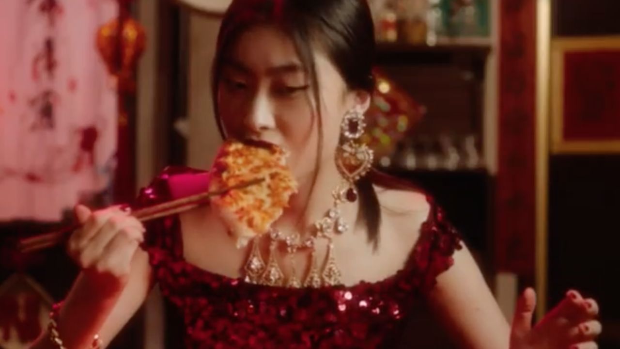 A video ad showing a Chinese woman struggling to eat pizza with chopsticks has unleashed a firestorm for D&G.