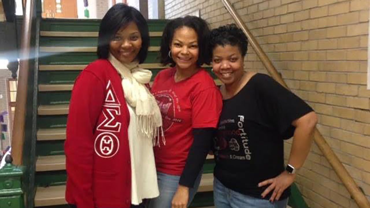 Aisha Fraser, middle, in a photo shared by the Shaker Heights Teachers' Association.