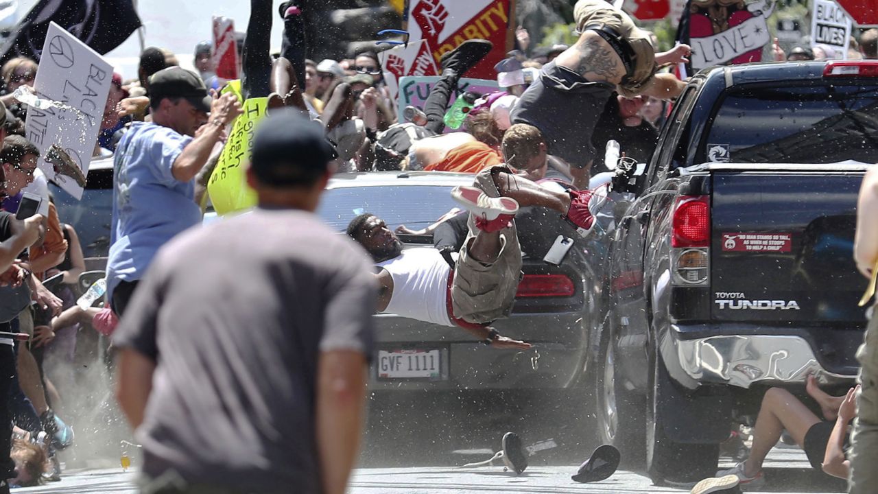 People fly into the air as Fields' car drives into a group of protesters in Charlottesville on August 12, 2017. The photo, taken by Ryan Kelly of The Daily Progress newspaper, won Kelly a Pulitzer Prize.