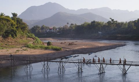 The Mekong is not just one river. Thousands of rivers and streams feed into the main river, including the Nam Khan tributary in Laos, pictured here. During the dry season, villagers build a bamboo bridge to cross the river.