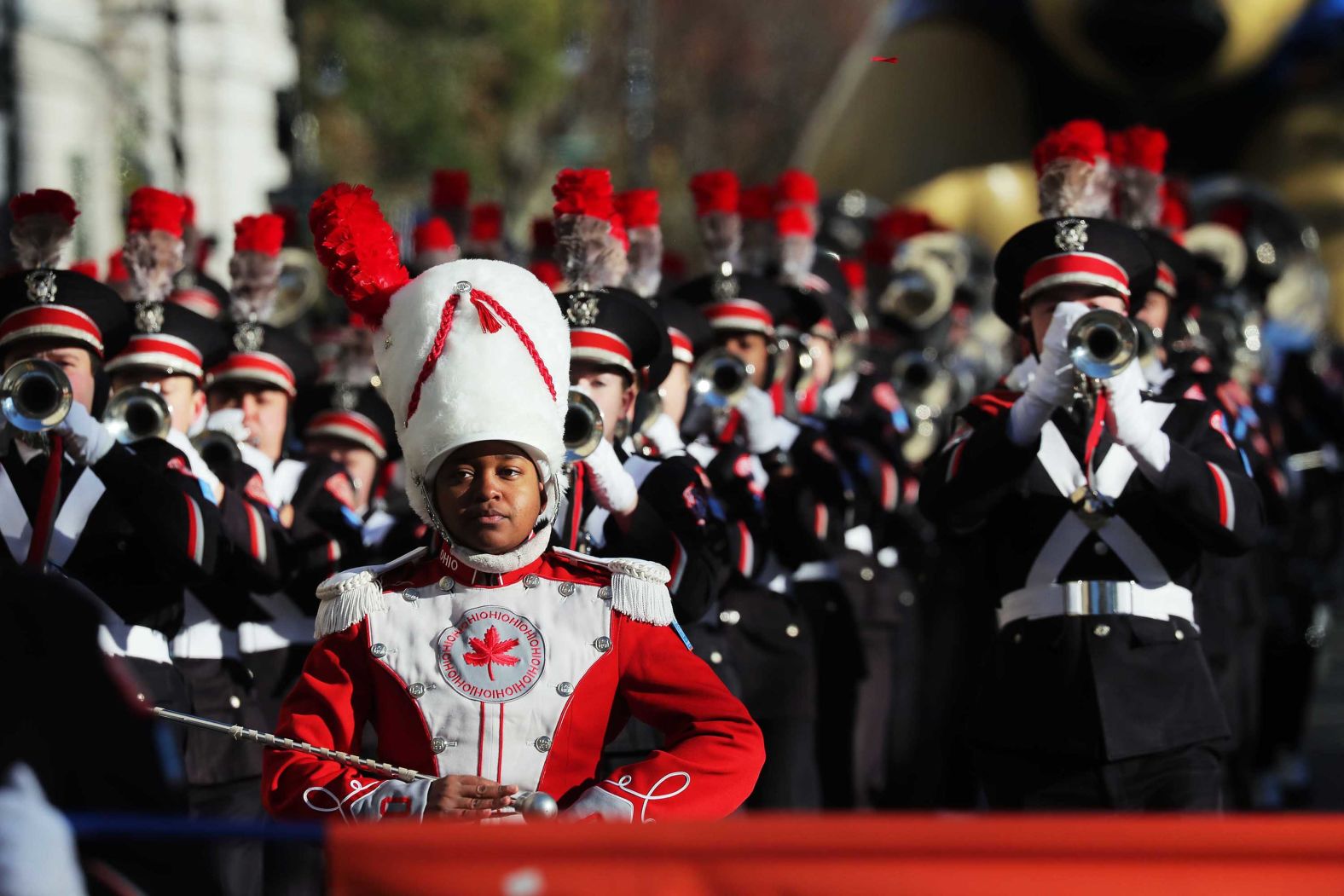 A marching band entertains the crowd.