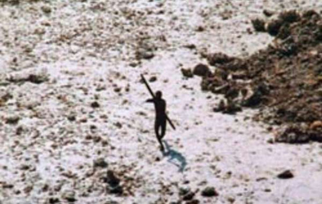 An image of a Sentinelese tribesman aiming a bow and arrow at a helicopter in 2004, following the Indian Ocean tsunami. 