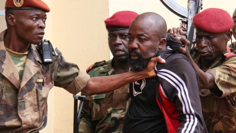 Yekatom (center) is arrested by members of the armed forces on October 29, before being handed over to the International Criminal Court.