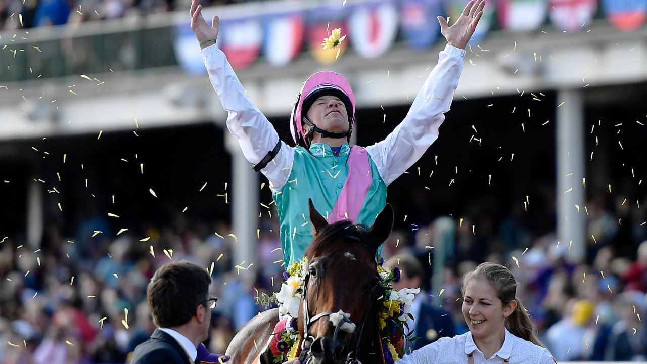 LOUISVILLE, KY - NOVEMBER 03:  Lanfranco Dettori celebrates after riding Expert Eye to victory in the Breeders' Cup Mile on the second day of the Breeders' Cup at Churchill Downs on November 3, 2018 in Louisville, Kentucky.  (Photo by Bobby Ellis/Getty Images)