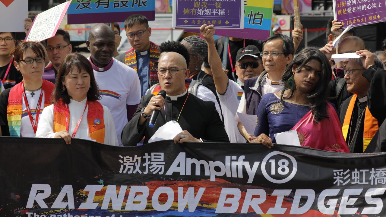 Members of a pro-gay Christian group assemble for the media before the start of a gay pride parade in Taipei on October 27, 2018.