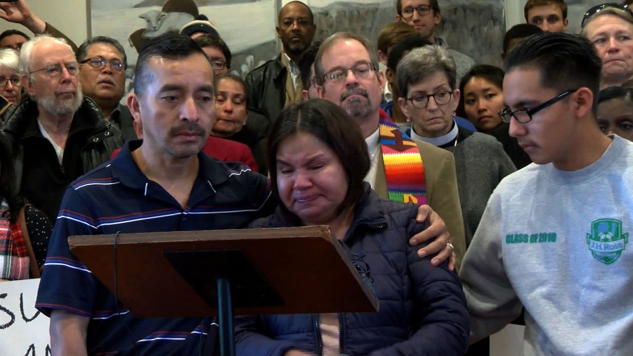 Samuel Oliver-Bruno stands with his wife and son during a press conference announcing he would be seeking sanctuary at City Well United Methodist Church in December 2017. 
