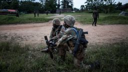 South African soldiers from the United Nations Stabilisation Mission in the Democratic Republic of the Congo (MONUSCO) set up a mortar position as gun fire erupts close by on October 07, 2018 outside Oicha. - The town of Oicha is the site of constant attacks by the ADF rebel group. MONUSCO soldiers are sent to help the Armed Forces of the Democratic republic of the Congo(FARDC) in the fight against ADF. (Photo by JOHN WESSELS / AFP)        (Photo credit should read JOHN WESSELS/AFP/Getty Images)