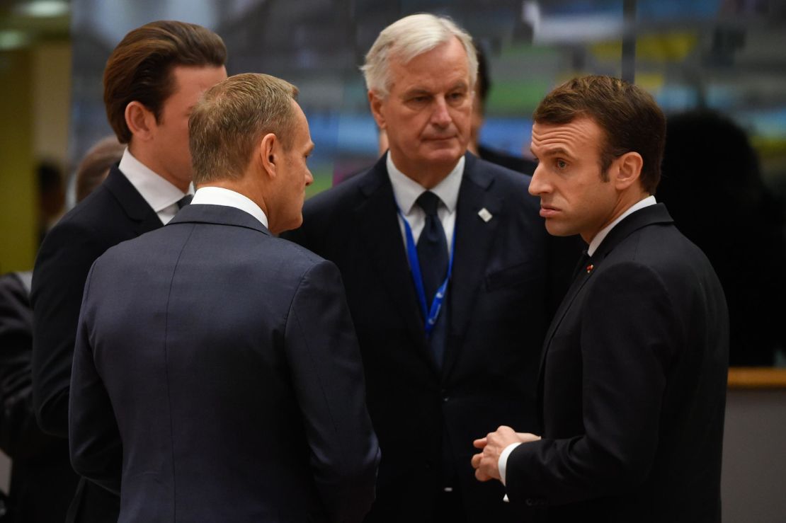 France's President Emmanuel Macron talks with EU chief Brexit negotiator Michel Barnier, Austria's Chancellor Sebastian Kurtz and European Council President Donald Tusk before the summit.