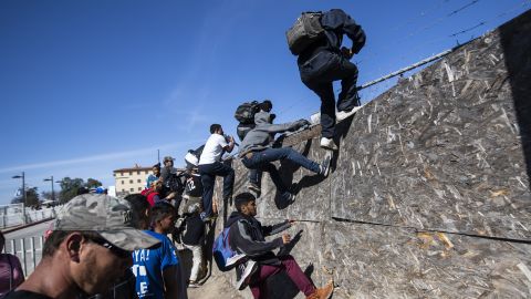 A group of Central American migrants, mostly from Honduras, tried to reach the US-Mexico border near the El Chaparral border crossing in Tijuana on November 25, after US officials temporarily closed the San Ysidro crossing point.
