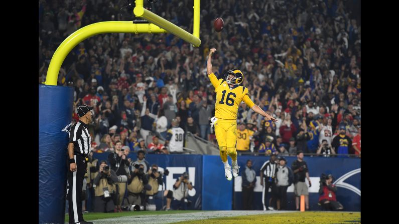 Quarterback Jared Goff of the Los Angeles Rams celebrates his touchdown during the third quarter of the game against the Kansas City Chiefs on Monday, November 19 in Los Angeles. The Rams won 54-51 in the third-highest-scoring affair in NFL history.