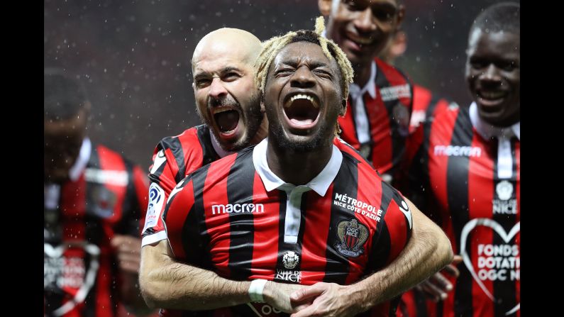 Nice's French midfielder Allan Saint-Maximin celebrates with teammates after scoring a goal during the French Ligue 1 soccer match between Nice and Lille in Nice, France on Sunday, November 25.