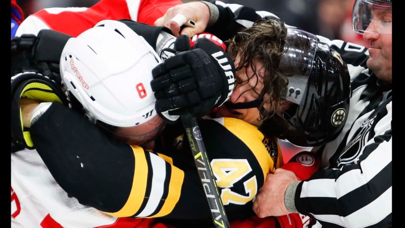 Justin Abdelkader of the Detroit Red Wings gets in a shoving match with Torey Krug of the Boston Bruins during the second period of a game in Detroit on Wednesday, November 21.