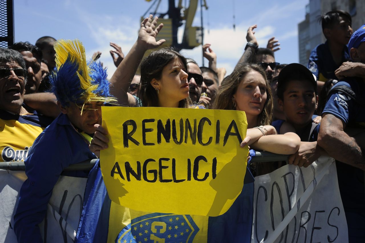 Boca Juniors fans gathered outside the team hotel in support, but some were demanding the resignation of club president Daniel Angelici after he had signed an agreement for the game to go ahead, despite several players being hospitalized.