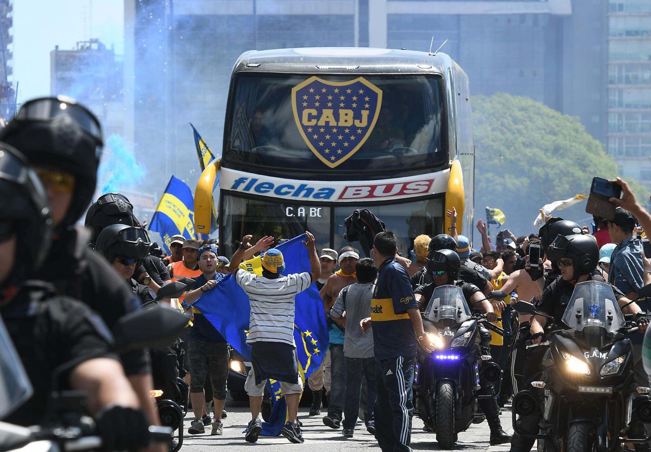 Picture released by Telam showing the Boca Juniors team bus leaving their hotel on the way to the Monumental stadium in Buenos Aires on Saturday before it was attacked.