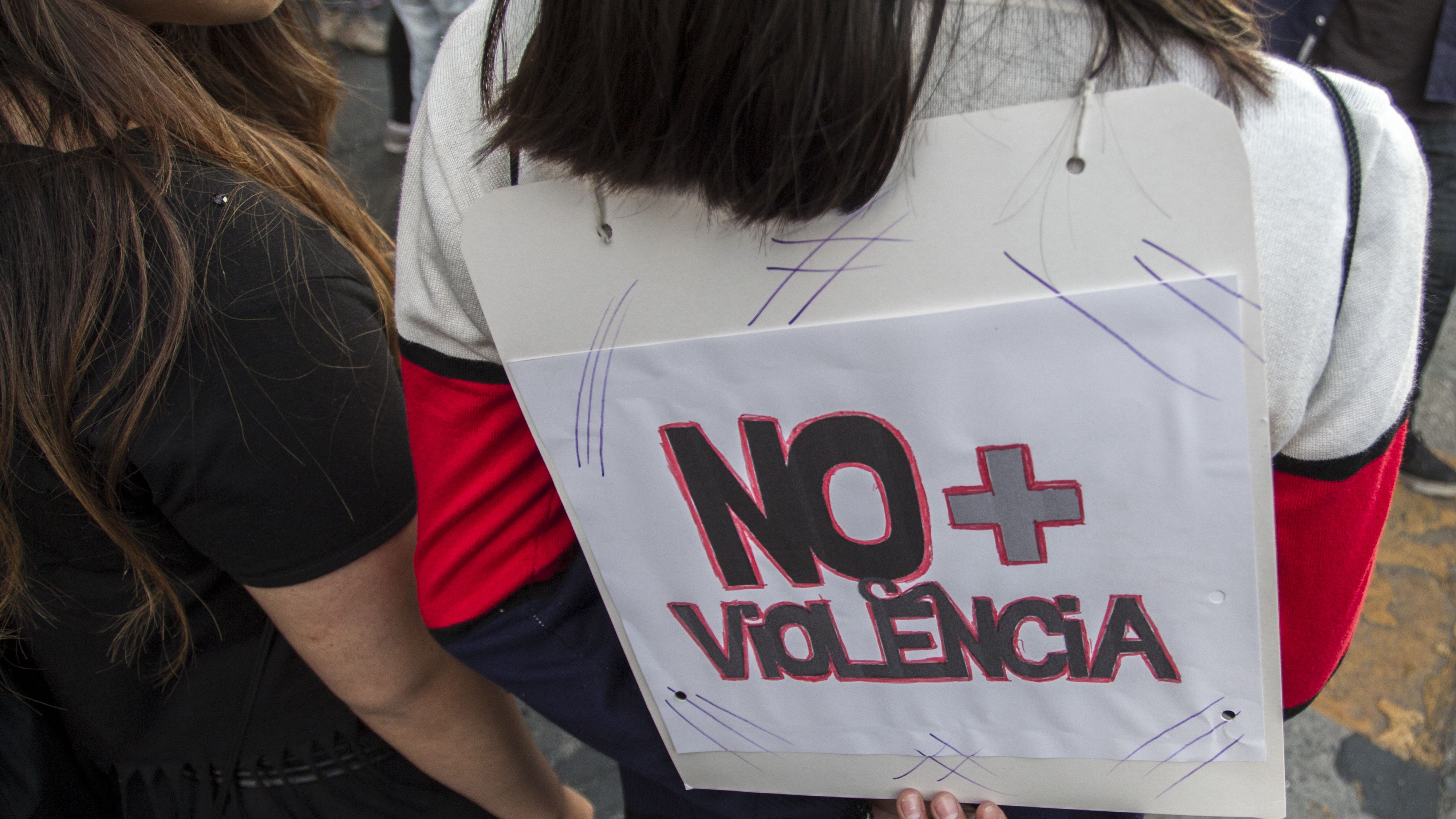 Women in Santiago, Chile, protest against gender-based violence on the International Day for the Elimination of Violence against Women on Sunday. 