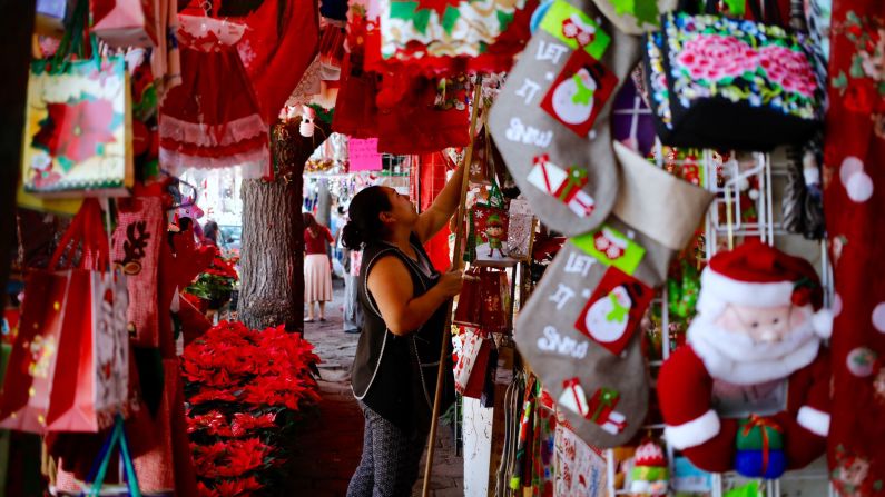 <strong>Advent in Mexico:</strong> Advent and the Christmas season in general are big in Mexico. Decorations are displayed for sale at a market in Mexico City.
