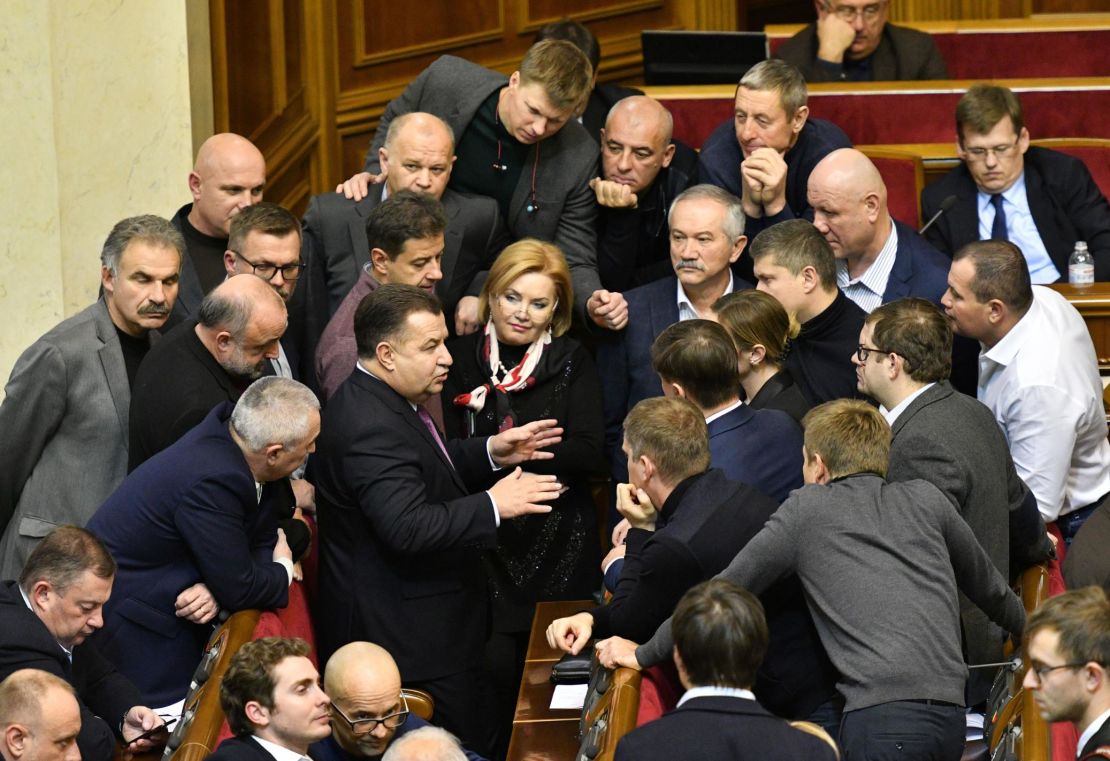 Ukranian MPs speaking ahead of a parliamentary vote on whether to impose martial law in the country.