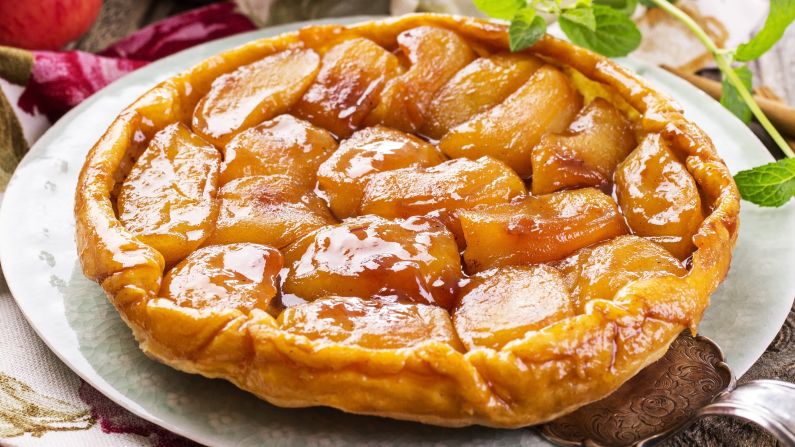 <strong>Tarte Tatin, France:</strong> Start by layering apples, sugar and butter in a heavy pan, then top it off with a round of pastry. The crust seals the filling into a steamy enclosure, allowing the sugar to caramelize as the apples melt. When the tart emerges from the oven, it must be flipped onto a plate before the molten sugar turns to sticky glue.