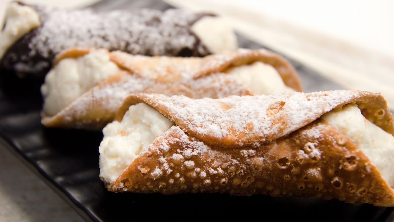 <strong>Cannoli, Sicily: </strong>A crispy shell holds a creamy cheese filling in this Sicilian classic.