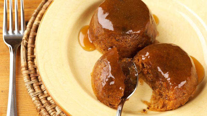 <strong>Sticky Toffee Pudding, United Kingdom: </strong>The ultimate in comforting British desserts, a base of soft cake is studded with chopped dates, then drowned in a creamy sauce. Much of the distinctive flavor comes from treacle, or molasses. 