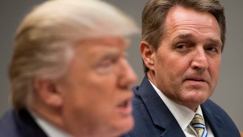US President Donald Trump speaks during a lunch meeting with Republican members of the Senate, including US Sen. Jeff Flake, Republican of Arizona, in the Roosevelt Room of the White House in December 2017. / AFP PHOTO / SAUL LOEB