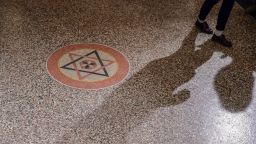 persuasive essay on the holocaust A member of Berlin's Jewish Community walks past the Star of David inside the Synagogue Rykestrasse in Berlin prior to a ceremony on November 9, 2018 to commemorate the 80th anniversary of the Kristallnacht Nazi pogrom. - Germany remembers victims of the Nazi pogrom that heralded the start of the Third Reich's drive to wipe out Jews, at a time when anti-Semitism is resurgent in the West. (Photo by Tobias SCHWARZ / AFP) (Photo credit should read TOBIAS SCHWARZ/AFP/Getty Images)
