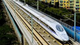 A Chinese high-speed train leaves the station in Shanghai on October 26, 2010 after the launch of the Shanghai to Hangzhou line. China's latest new high-speed passenger rail line went into service, halving travel time to 45 minutes between Shanghai and the eastern lake city of Hangzhou, officials said.           CHINA OUT        AFP PHOTO (Photo credit should read STR/AFP/Getty Images)