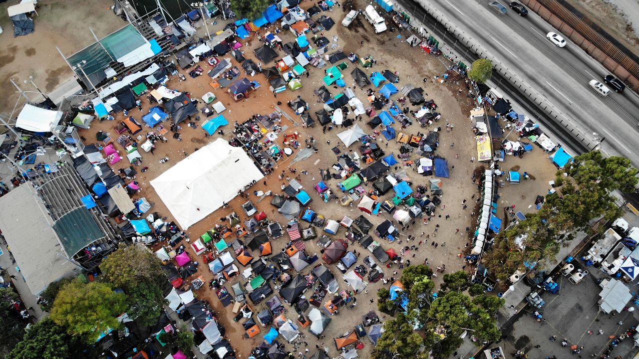 TIJUANA, MEXICO - NOVEMBER 24:  An aerial view of the temporary shelter set up for members of the 'migrant caravan', with a section of the U.S.-Mexico border barrier visible (TOP R),  on November 24, 2018 in Tijuana, Mexico. Around 6,000 migrants from Central America have arrived in the city with the mayor of Tijuana declaring the situation a 'humanitarian crisis'. Most migrants in the caravan say they plan to petition for asylum in the U.S. The incoming government in Mexico will reportedly support a new Trump administration policy requiring migrants asking for asylum in the U.S. to remain in Mexico while their cases are processed. 