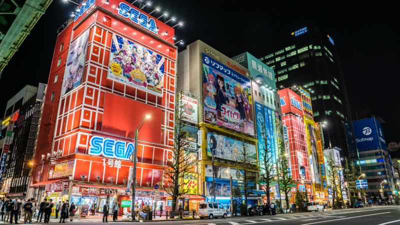 People walk in Akihabara area of Tokyo Japan It is a popular place to buy  electronics anime manga and has many maid cafes Stock Photo  Alamy