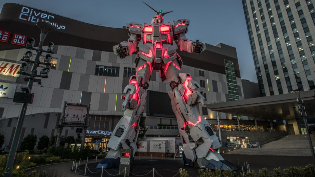 <strong>Gundam:</strong> Life size and formidable, the statue greets visitors on Odaiba, a man-made island in Tokyo. True devotees can try to build their own models in The Gundam Base Tokyo shop.